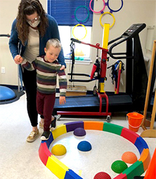 James receiving children's physical therapy