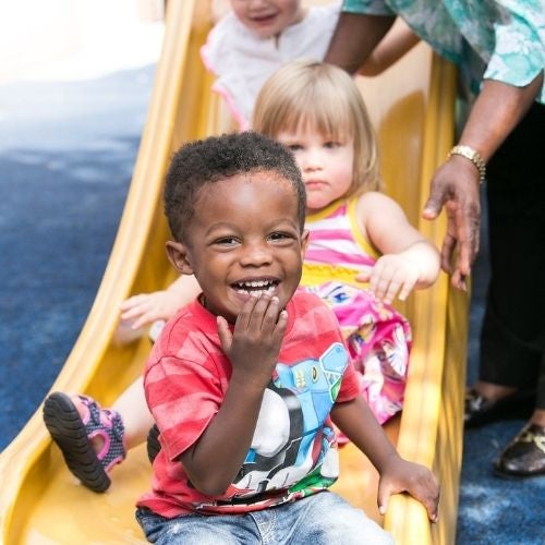 Children coming down a slide