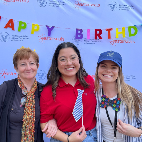 3 Cohen Clinic staff members standing in front of an Easterseals backdrop.