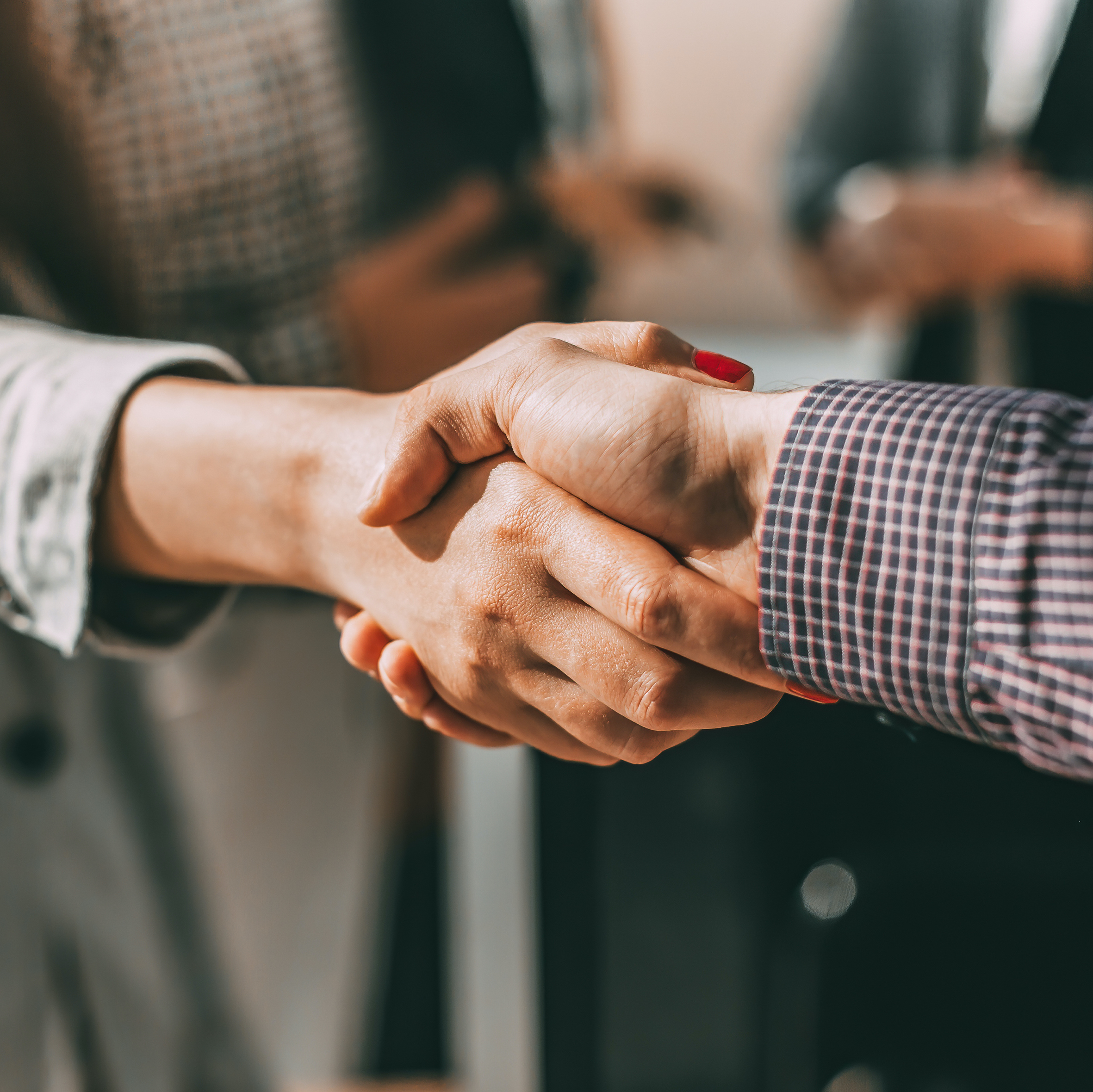 handshake between two people