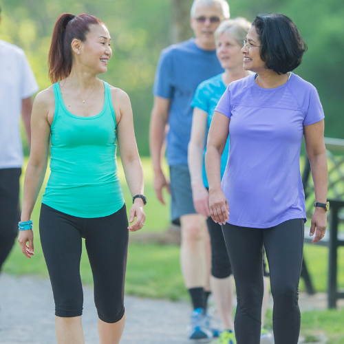 A group of people walking together on a path