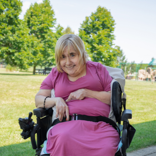 Amy in a pink dress at ambassador photoshoot
