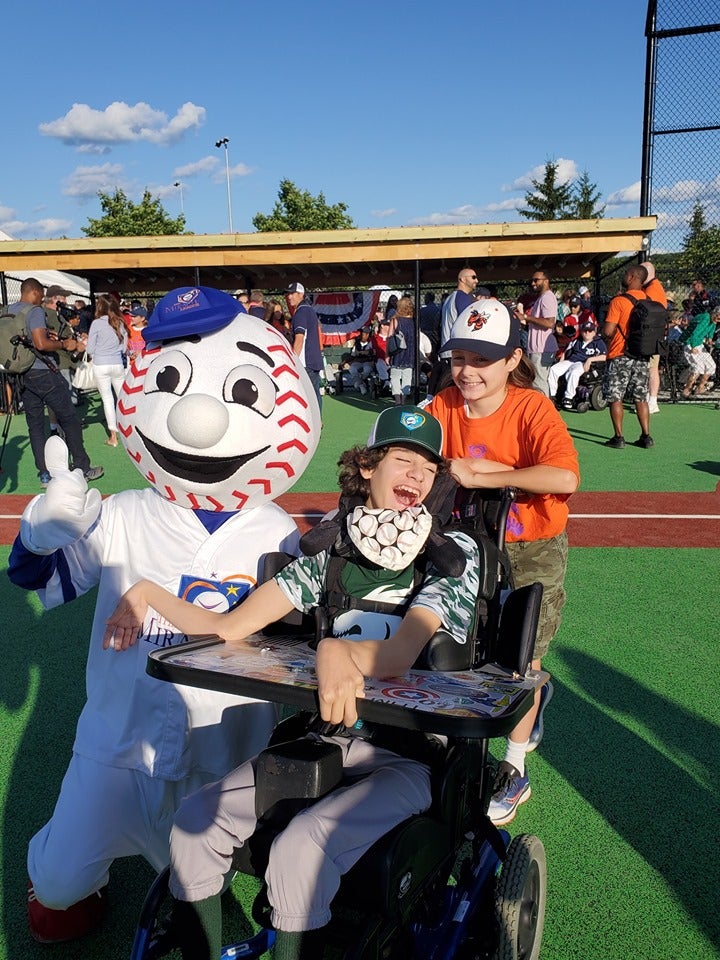 Zander with Homer and buddy and the grand opening of Miracle League North Oakland