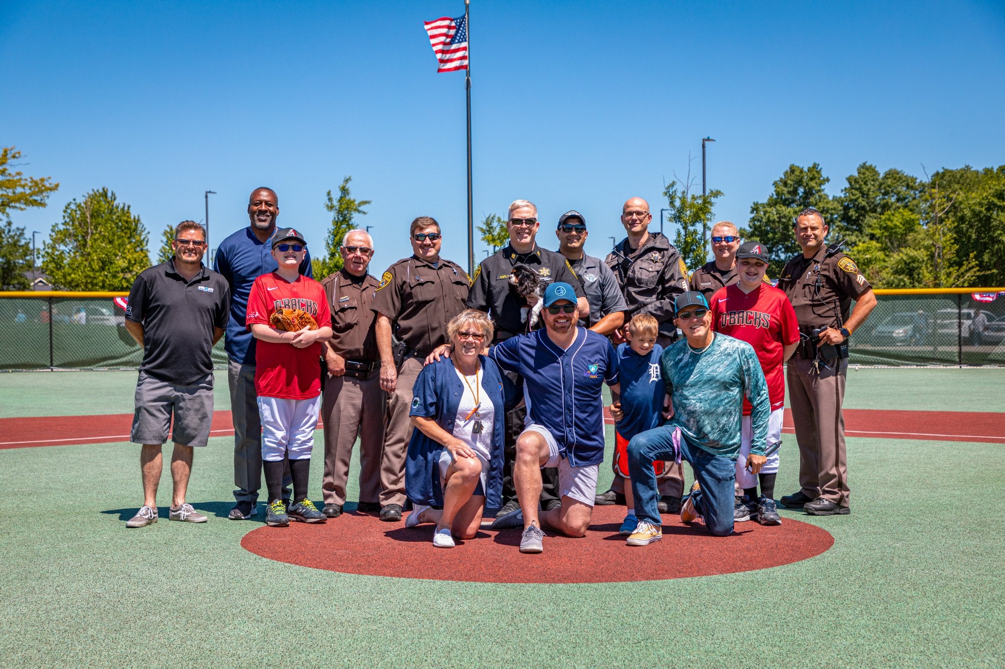 on the pitchers mound with involved individuals 