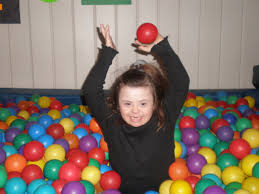 Girl in a ball pit