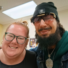 image of male and woman smiling in a selfie