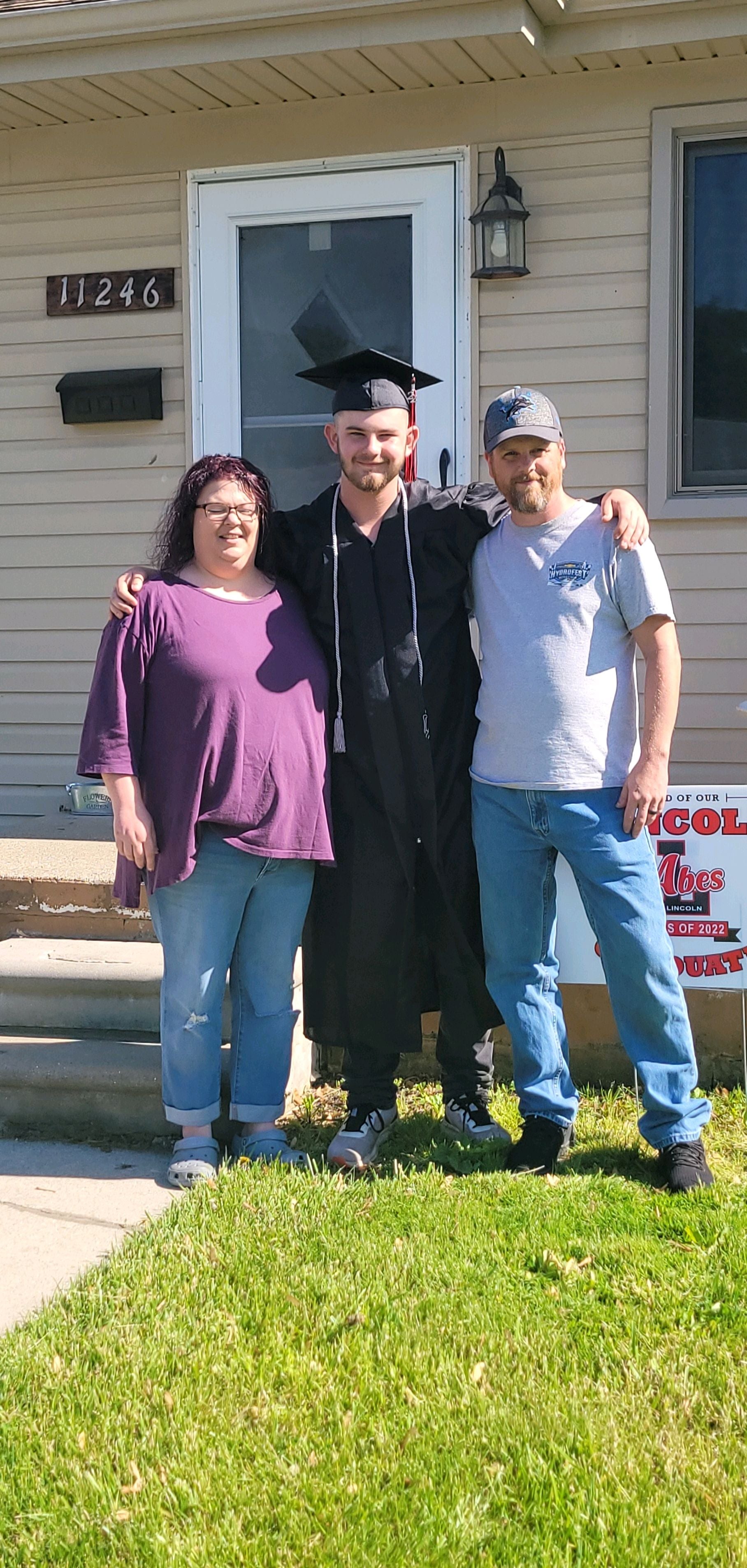 Jenn, her son, and husband 