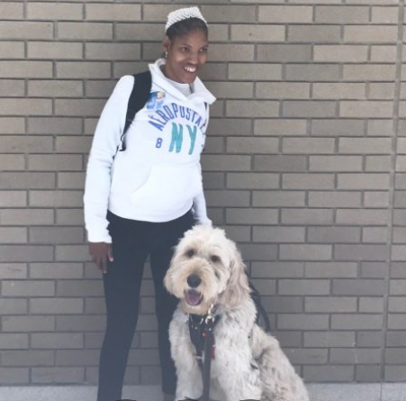 Kiara and her service dog