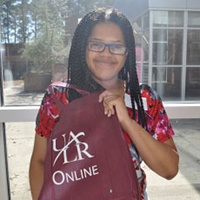 Easterseals client with UA Little Rock bag