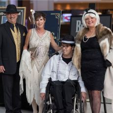 a group of 4 people dressed in 1920's clothes at the ESC Gala
