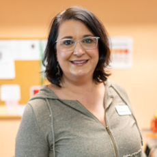 a photo of a woman smiling at the camera