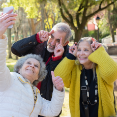 three people taking a selfie