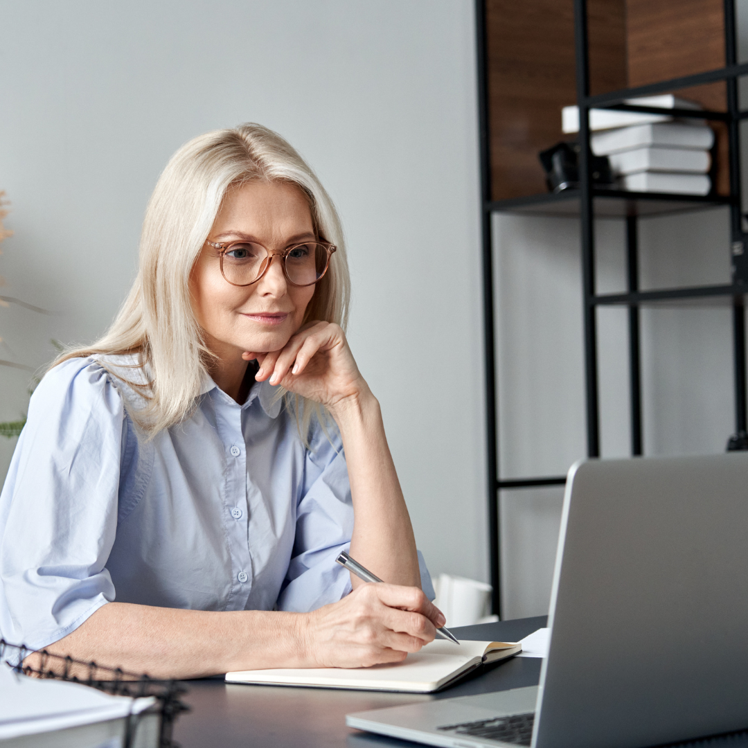 woman looking at a laptop