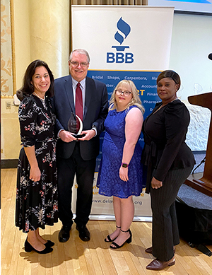 Christine Sauers, Ken Skelenar, Mikayla Buterbaugh, and Camille Pringle at Better Business Bureau award lunch