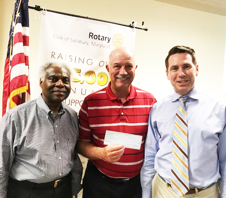 Donnie William Foundation Board Members, Allen Brown (left) and Mark Granger (right) present $10,000 to Ford Waggoner (center), director of marketing for Easterseals Delaware & Maryland’s Eastern Shore.