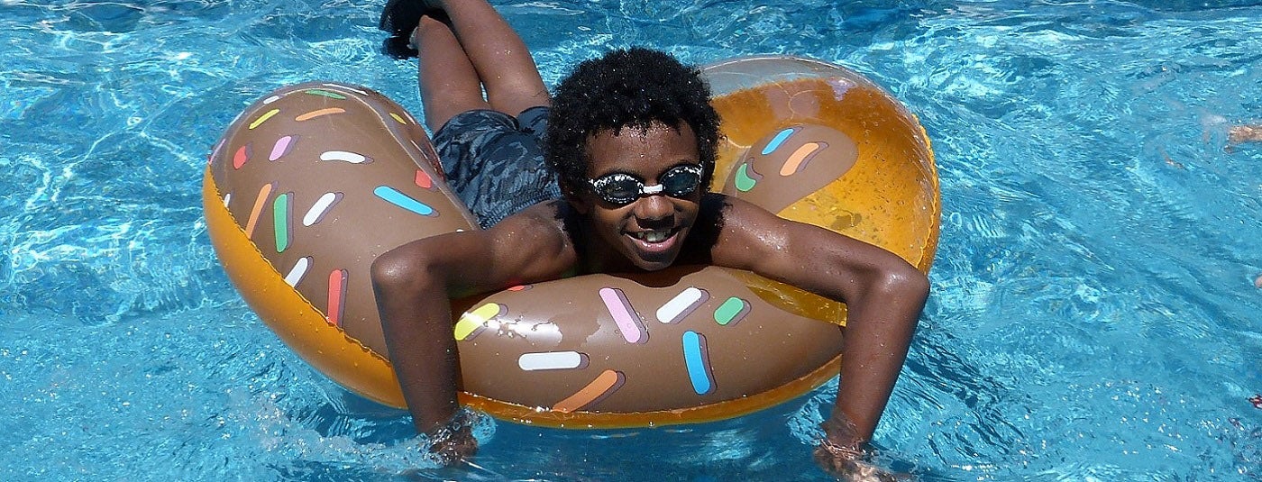 Boy on donut float