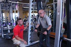 Dave working out using lifting hooks