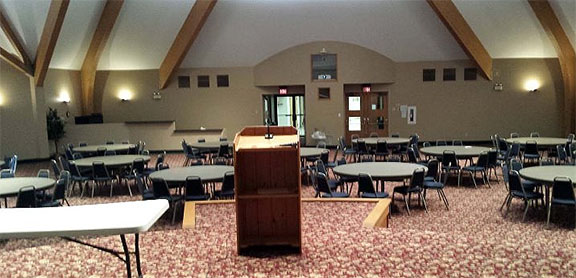 Crescent Room corporate classroom setup viewed from stage with podium