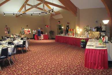 Crescent Room corporate event showing auction table setup