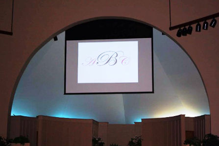 Crescent Room weddings-special events monogram project on video screen