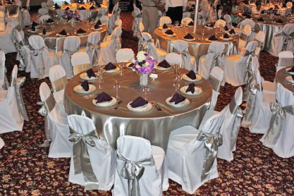 Crescent Room weddings-special events tables and draped chairs viewed from above