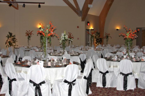 Crescent Room weddings-special events with tables and draped chairs viewed from floor level