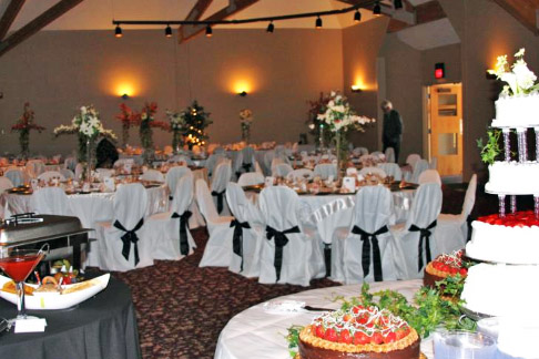 Crescent Room weddings-special events with wedding cake table in foreground