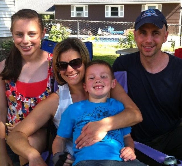 Chris Richards with his wife and two children