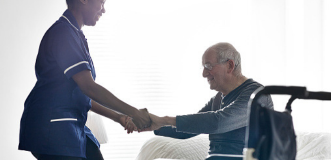 adult with disability receiving rehabilitation services from an aide