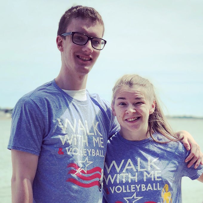 Matthew Jameson posing and smiling with his girlfriend