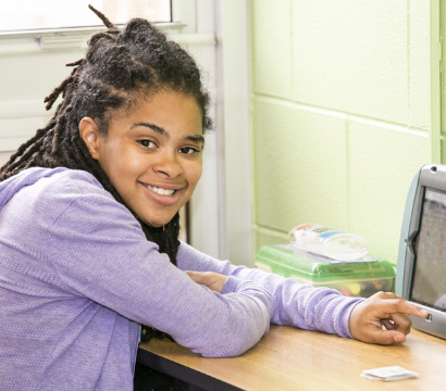 young woman uses a tablet device