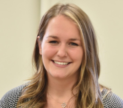 close-up headshot of Michela, an Easterseals Occupational Therapist, smiling.