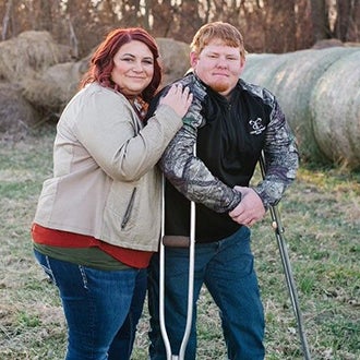 Jacie and Heath Osborn pose on their Nebraska farm