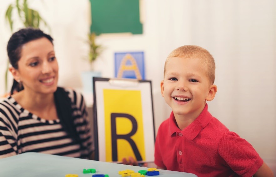 Autism training image with teacher and child