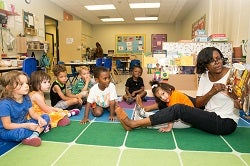 kids on mat, kids playing on mat