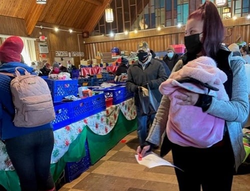 people at Port Jervis Holiday gift distribution event