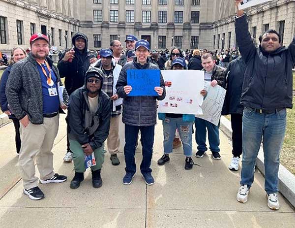 Easterseals New Jersey Advocates standing in front of the State House in Trendon