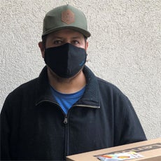 Connecting Communities Program participant, Manuel - wearing his safety mask