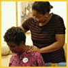 Adult Day Services program participant receiving a backrub