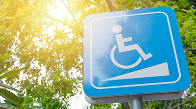 A sign with the accessibility symbol - an figure of a person in a wheelchair