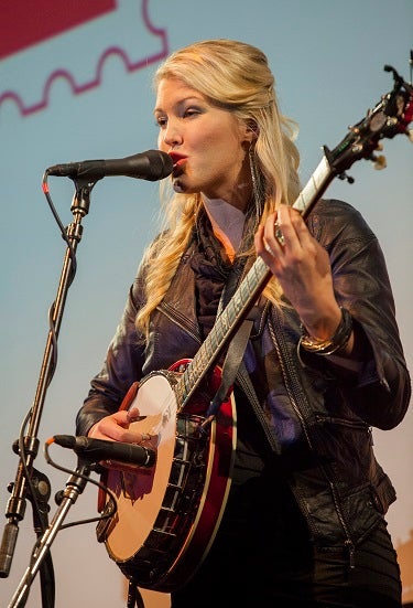 Ashley Campbell playing guitar