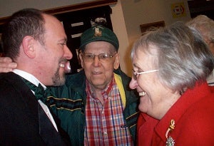 caregiver Luc with his parents