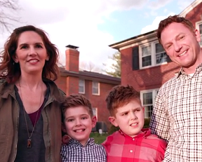 The Owens family in front of their house