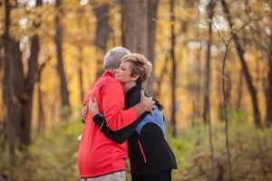 Scott and Kelly rider hugging