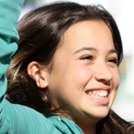 close up of young girl smiling