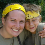 close up of mom and son wearing yellow bandanas