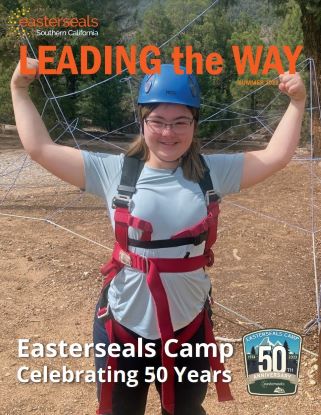 the cover of the Summer 2023 magazine with an image of a girl flexing her muscles at Easterseals Camp