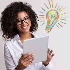 Woman smiling and looking at piece of paper next to animated lightbulb