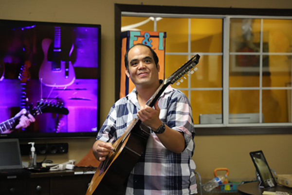 Robert Playing Guitar