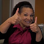 Woman giving a thumbs up